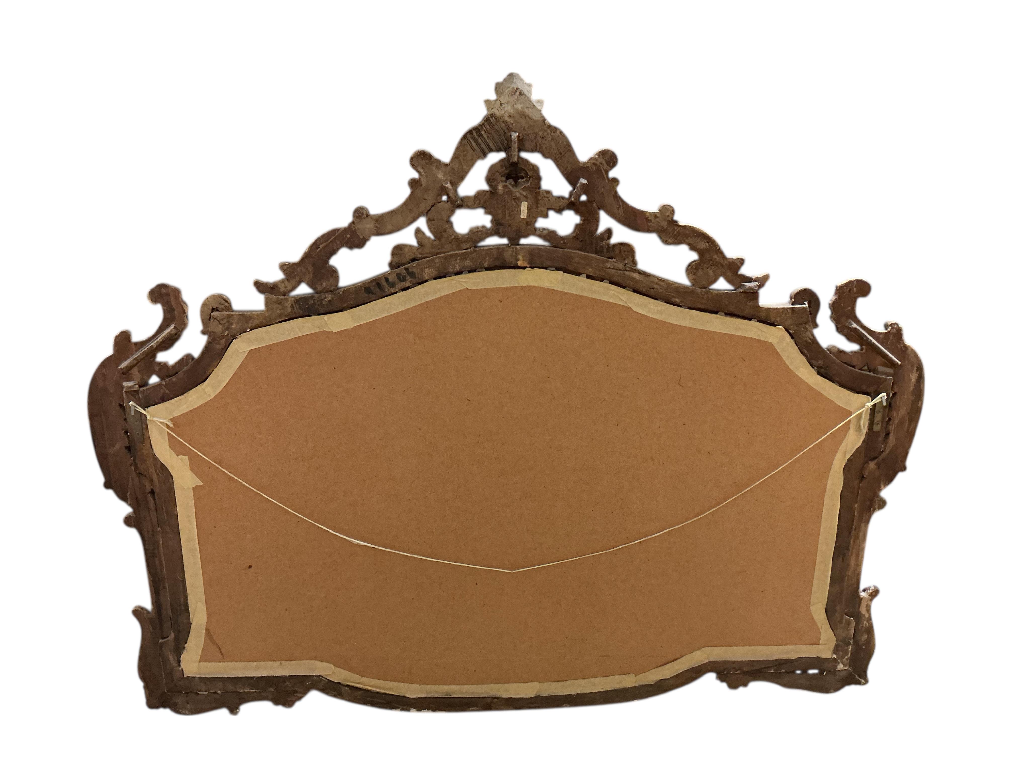 A Victorian style carved giltwood and composition wall mirror, width 120cm, height 95cm